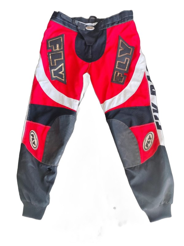 Pre-owned red and black Fly Racing Motocross riding pants