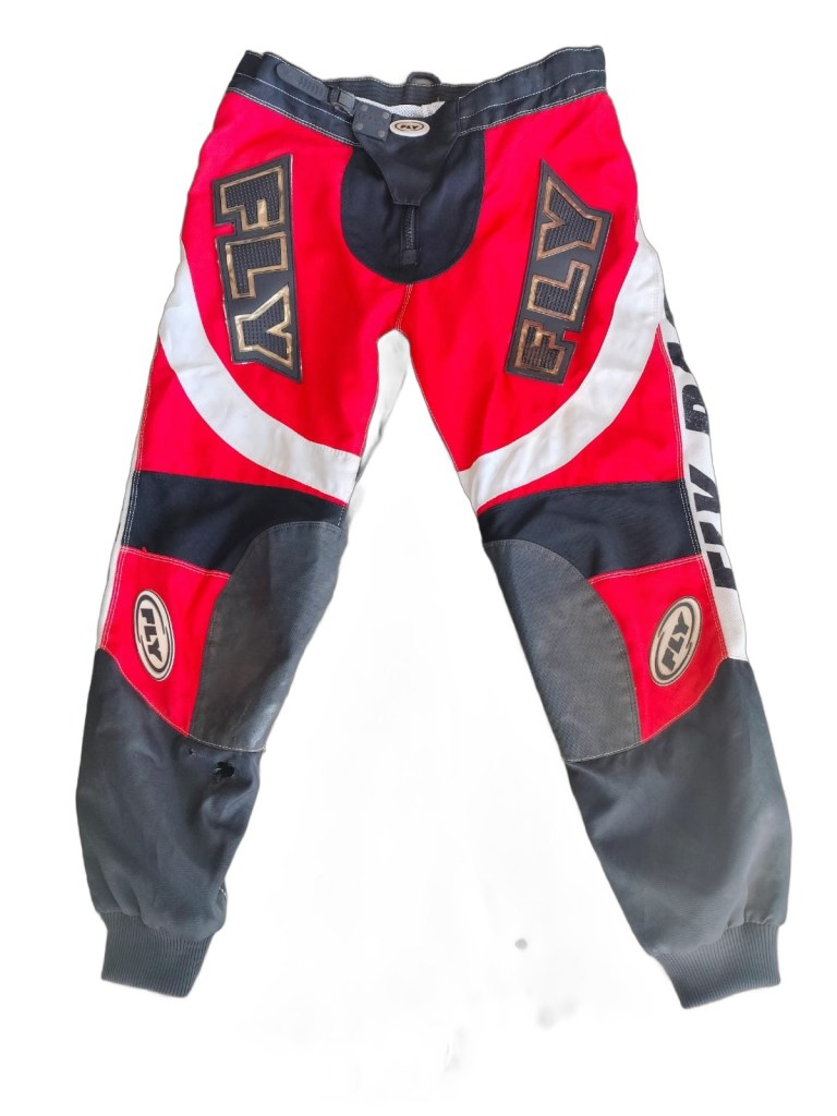 Pre-owned red and black Fly Racing Motocross riding pants